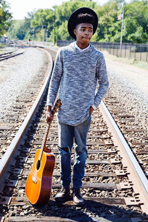 Jireh with his guitar