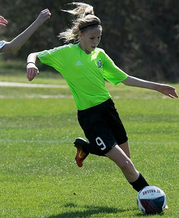 Sawyer playing soccer