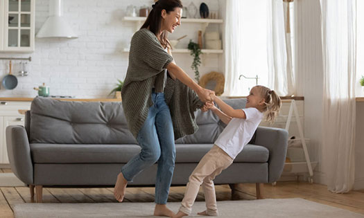Mom and daughter playing.
