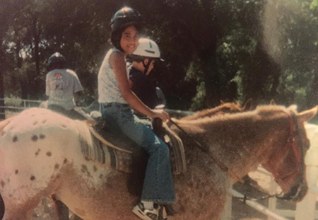 little girl riding a horse